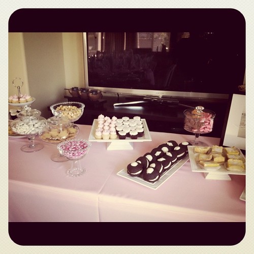 The table included mini pink vanilla cupcakes mini red velvet cupcakes with