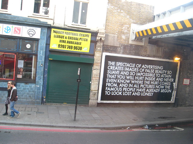 The Spectacle of Advertising Creates Images of False Beauty - Old Street, London, 2010