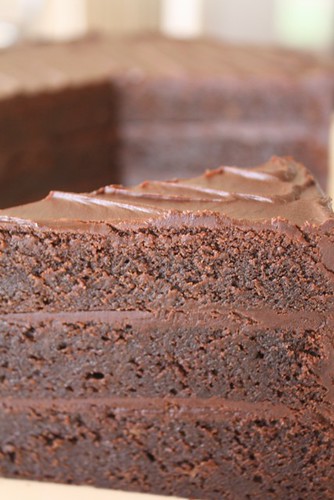 Dark chocolate mud cake filled with dark chocolate ganache by Louisa Morris Cakes