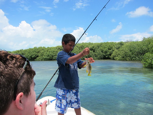 Justin catching a fish