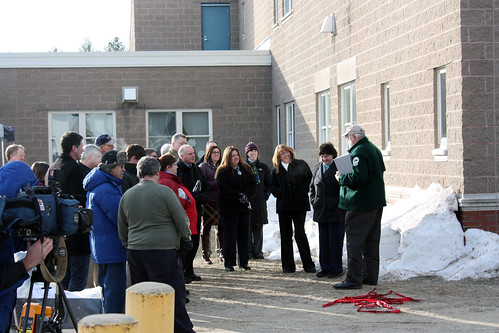 Maine Fuels for Schools. Maine Forest Service Senior Planner, Tom Wood, far right, speaks with staff from Maine's senate delegation, the U.S. Forest Service, Poland Regional High School Principal Cari Medd, school district and committee representatives, and other guests.