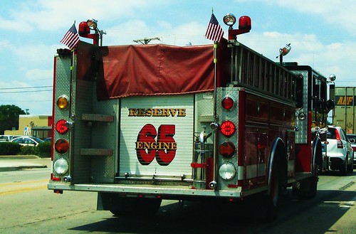 Des Plaines Fire Department pumper truck # 65 on Oakton Street.  Des Plaines Illinois USA. July 2011. by Eddie from Chicago