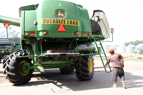 Johan opens up the combine so we can service it.