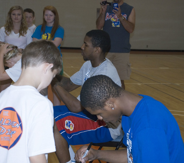 Ben McLemore and Thomas Robinson sign autographs