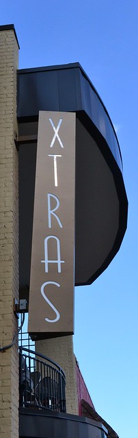 Xtras Sign