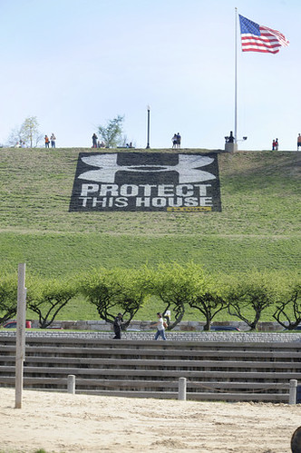 The Under Armour logo and slogan painted on Federal Hill in Baltimore.