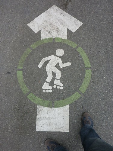Hipster skating person sign in Stanley Park