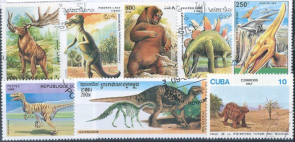 Známky - 25 rôznych, praveké zvieratá - dinosaury