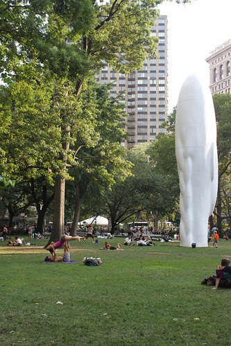 Yoga couple in the Madison Square Park of New York