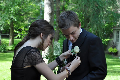 Pinning on the boutonniere