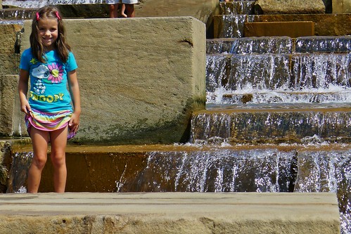 Texas Invasion:  Lauren splashing in the fountain.
