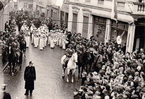 Carnival parade with historical costumes. 1950s Germany? Unidentified town.