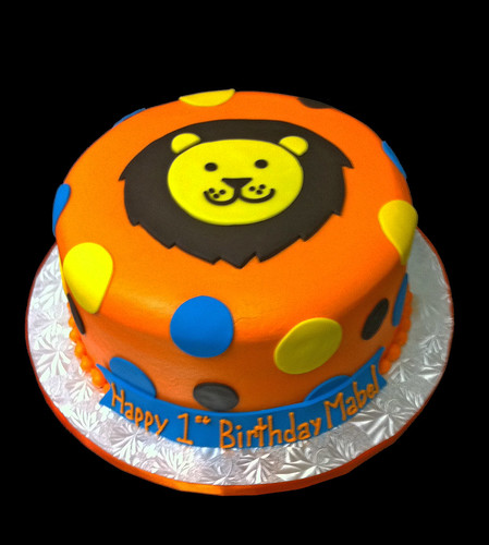 1st birthday lion cake orange yellow blue and brown