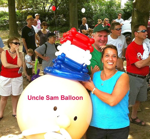 Hannah wins Uncle Sam Balloon at Bocce Club July 4th  Celebration at Water Tower
