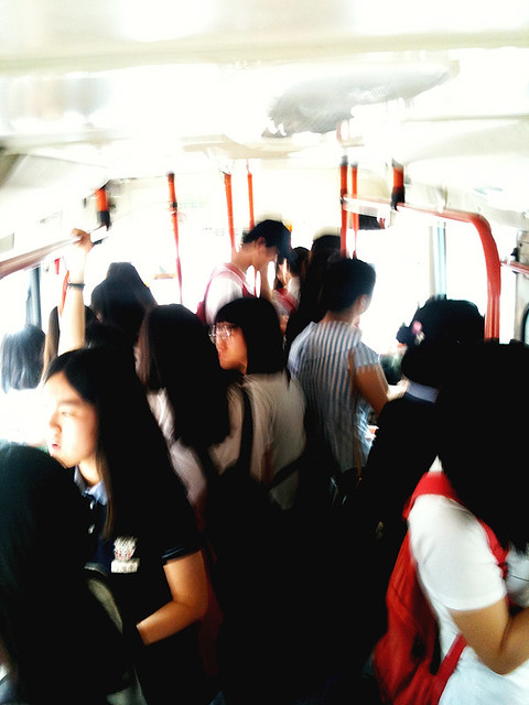 Town bus, full of highschoolers 