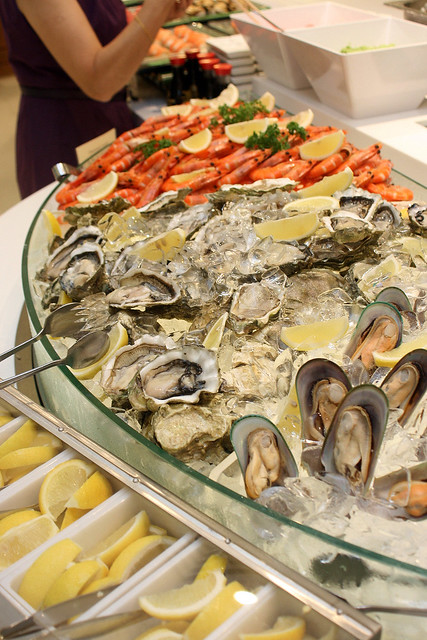 Seafood on ice - prawns, oysters, mussels