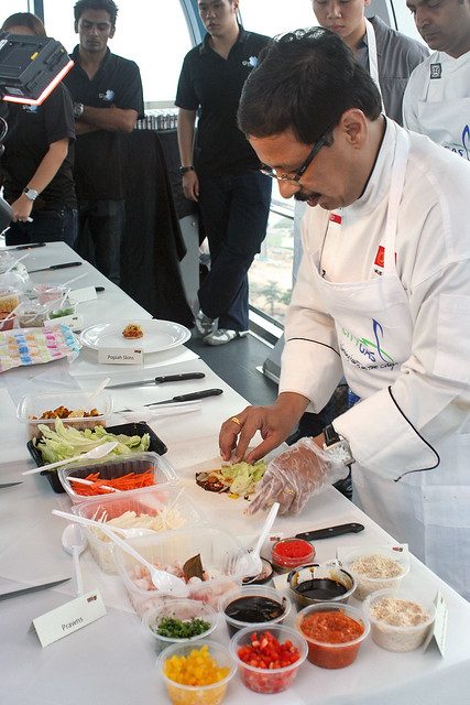 Chef Milind Sovani demonstrating canapes on board the Singapore Flyer