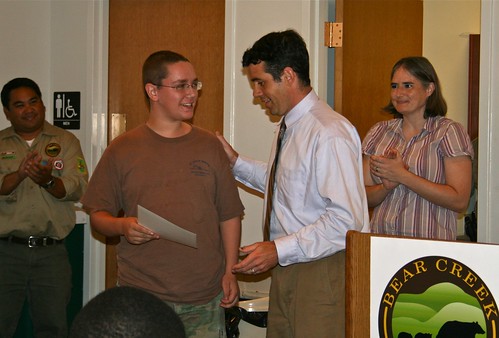 Bear Creek Academy graduate receives certificate.