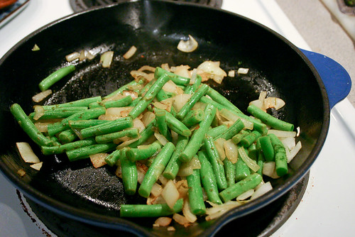 saute onions and string beans