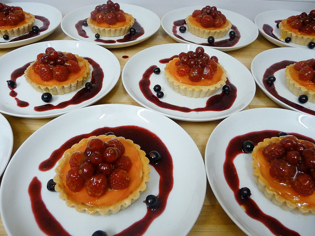 Summer berry tartlets with cassis coulis