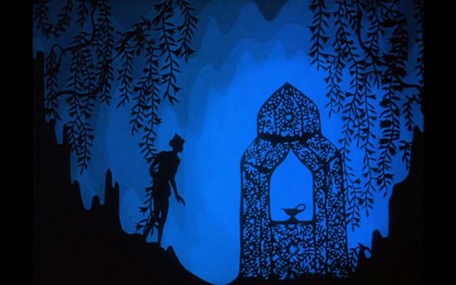 An intricate black shadow design of Aladdin discovering the lamp in the cave against a blue background.