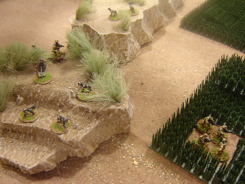 Dismounted soldiers descend into fields