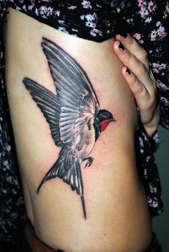 Swallow bird tattoo by gettattoo