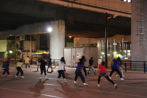 Dance Group under a highway in Kobe at night