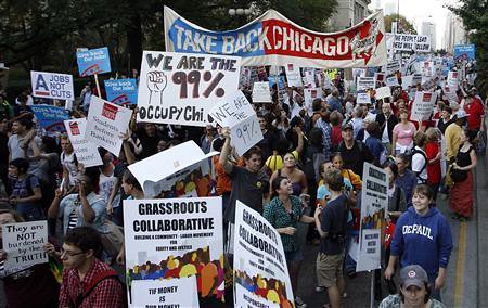 Thousands demonstrate in Chicago on October 10 as the "Occupy Wall Street" movement spreads around the United States. Demonstrations have erupted that focus on the need to take control of the economic direction of the country. by Pan-African News Wire File Photos