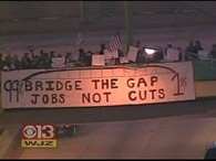Sign on Occupied Howard Street Bridge