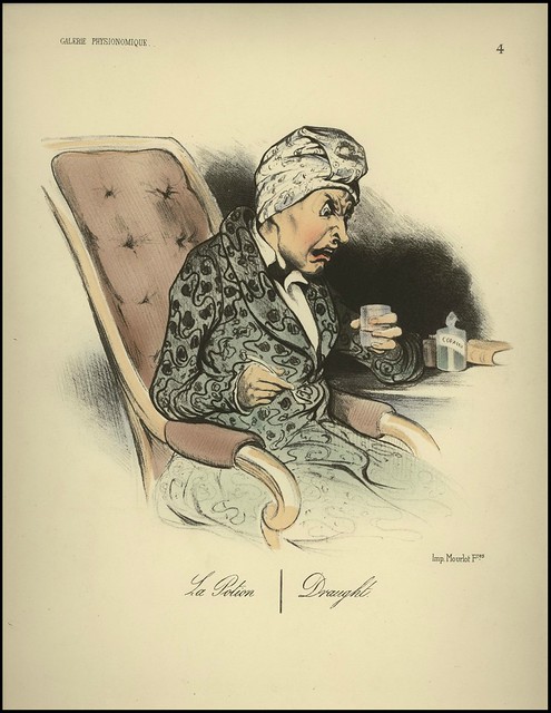 seated, obviously angrily distressed, old woman with head scarf holds glass
