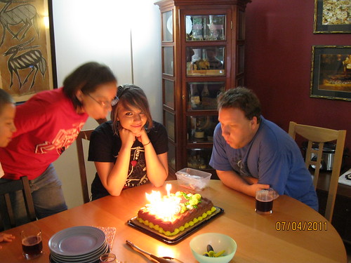 7/4/11: Why is Katherine in the center seat for our cake??