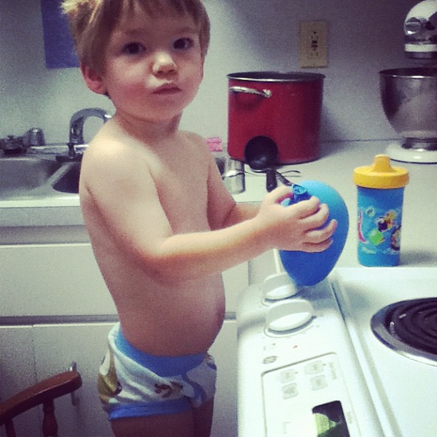 Potty training day #1...helping mommy cook breakfast
