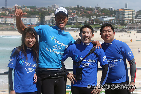 The three of us with our cool surfing coach (all surfing images provided by Let's Go Surfing)
