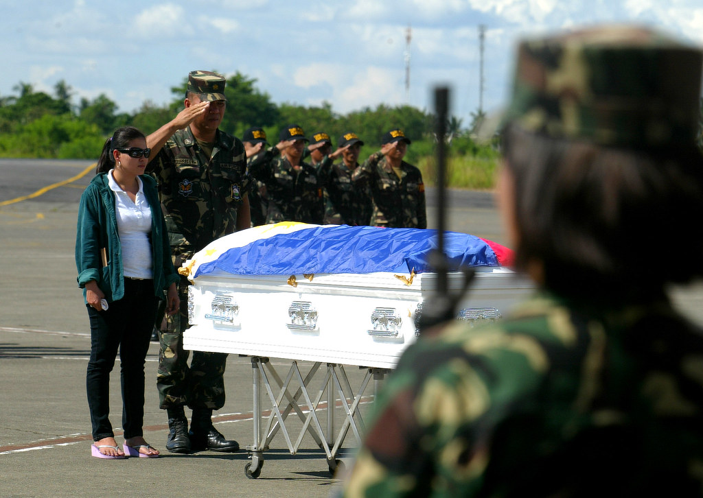 Jennifer Mabalot, 31, wife of the slain soldier at old Davao International Airport  tarmac on Friday, October 21. 
