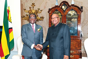 Presidents Robert Mugabe of Zimbabwe and Jacob Zuma of South Africa. The neighboring southern African states are members of the Southern African Development Community (SADC). by Pan-African News Wire File Photos