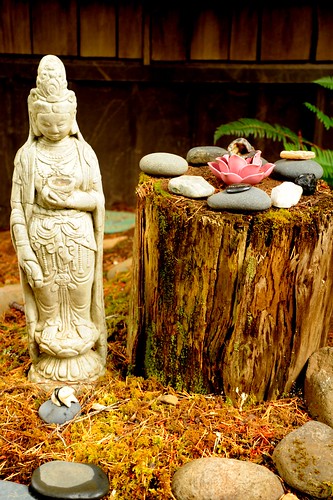 Female Bodhisattva statue, lotus, spiral offering stone stages-of-the-path, log, moss, Breitenbush Hot Springs, Breitenbush, Marion County, Oregon, USA by Wonderlane