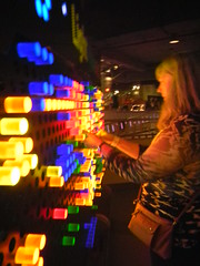 Laura plays with the Lite Brite