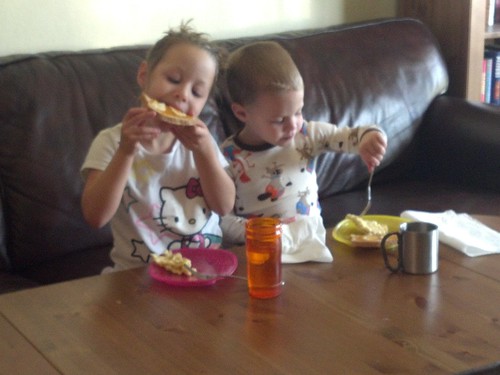 Daisy and Billy eating lunch in the living room