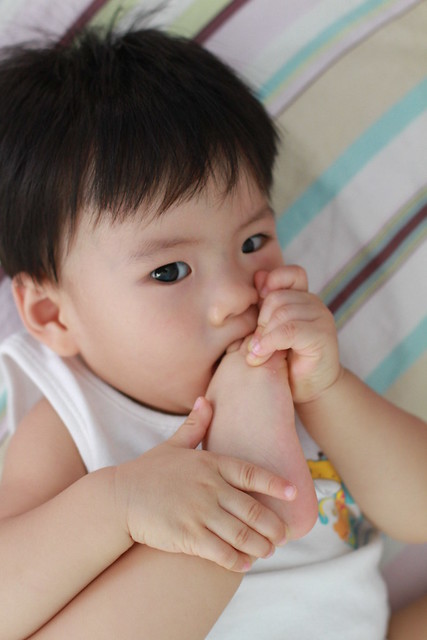 Baby Marcus Munching His Foot & Fingers