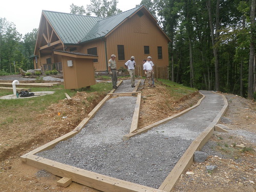 The Natural Tunnel Crew work on an accessible walkway from the lodge to a picnic pad