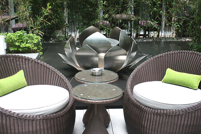 Lotus-shaped open fires and running waterways provide contrasting elements of nature