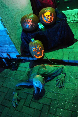 Front door zombie and pumpkins