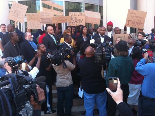 Rally in Atlanta outside police headquarters after people were arrested in the Occupy Atlanta protest movement. Occupy movements have spread throughout the U.S. and the world. by Pan-African News Wire File Photos