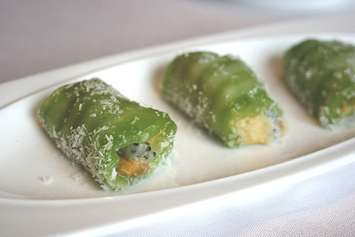 A fruity dessert wrapped in glutinous rice skin and shredded coconut