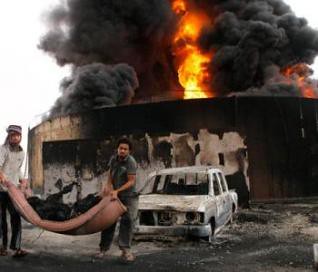 An large explosion hit Sirte on October 25, 2011. This is a bastion of resistance to the US-NATO war against the North African state of Libya. by Pan-African News Wire File Photos