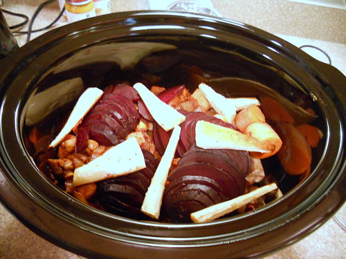 Roasting beets and parsnips in slow cooker.