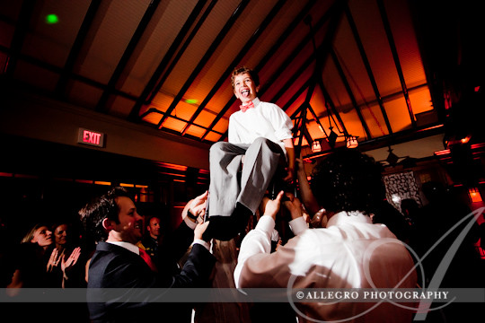 look-park-wedding-northampton-ma-reception- groom's son goes up in the chair for the horah