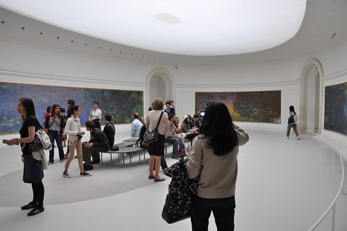 A rounded room of Monet works