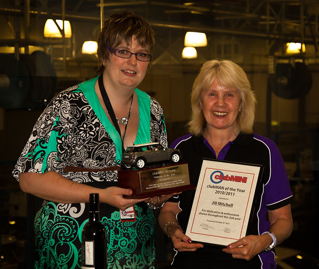 Jill Mitchell is presented with "Clubman of the Year" by outgoing president Ruth Harrison Brown